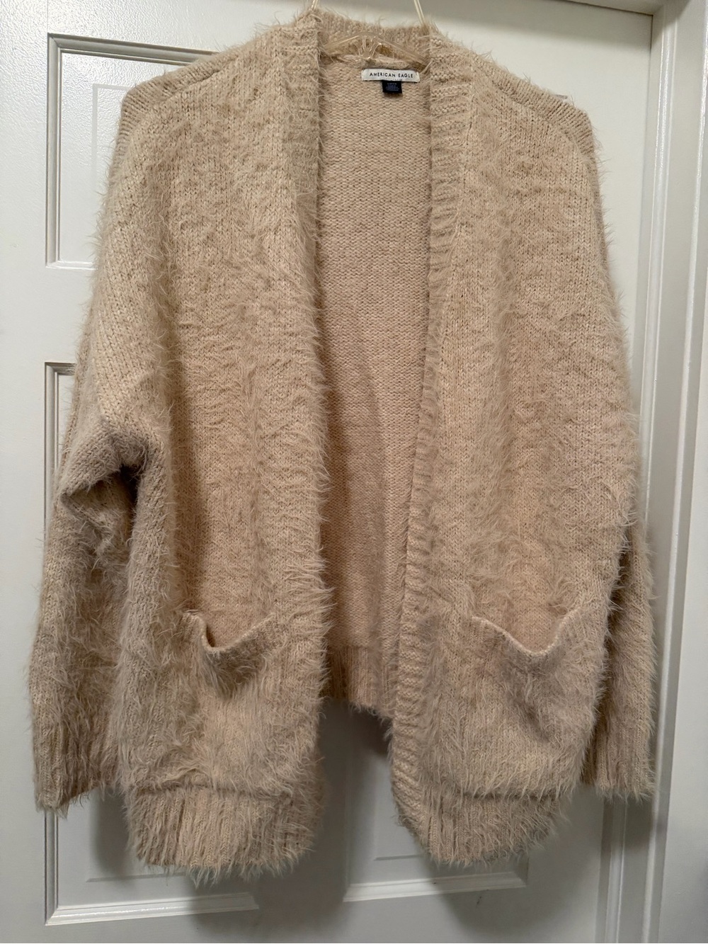 American Eagle Outfitters Fuzzy Open-Front Cardigan in Beige